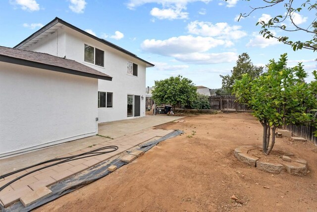 1220 Hoover St, Escondido, CA 92027 - fenced backyard with a patio