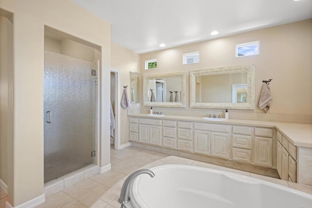 2185 Twain Ave, Carlsbad, CA 92008 - full bathroom featuring double vanity, a shower stall, tile patterned flooring, a bathtub, and baseboards