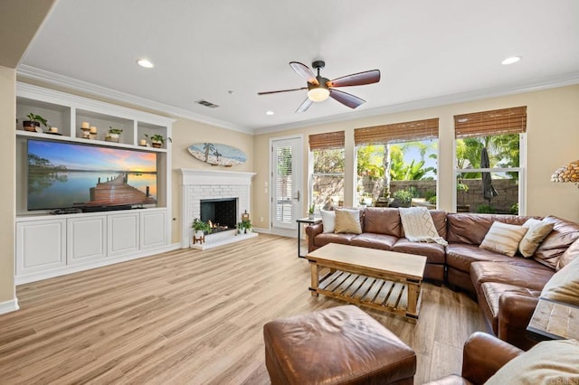 2185 Twain Ave, Carlsbad, CA 92008 - living room with ceiling fan, plenty of natural light, crown molding, light wood-style flooring, and recessed lighting