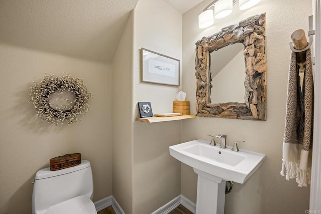 2185 Twain Ave, Carlsbad, CA 92008 - half bathroom with toilet and lofted ceiling