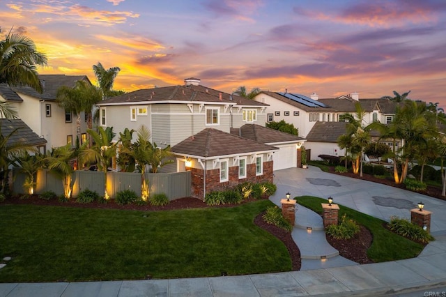 2185 Twain Ave, Carlsbad, CA 92008 - view of front facade with driveway, an attached garage, and a tile roof