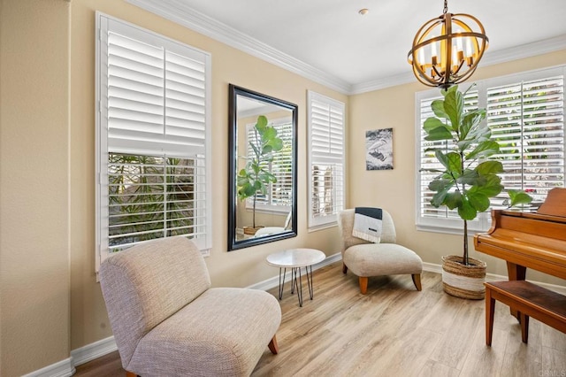 2185 Twain Ave, Carlsbad, CA 92008 - sitting room with a chandelier, plenty of natural light, ornamental molding, wood finished floors, and baseboards