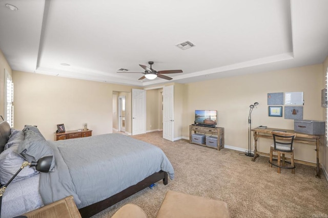 2185 Twain Ave, Carlsbad, CA 92008 - carpeted bedroom featuring a tray ceiling, baseboards, and a ceiling fan