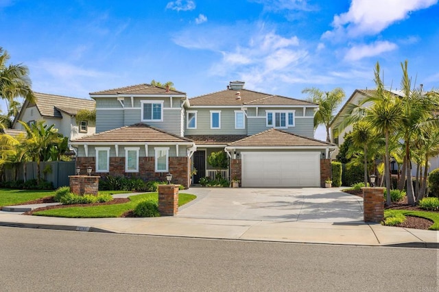 2185 Twain Ave, Carlsbad, CA 92008 - view of front of property featuring concrete driveway, an attached garage, and a tiled roof