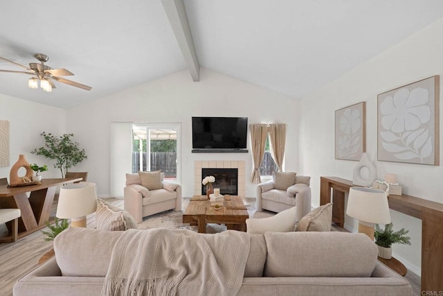 4938 Dulin Rd, Fallbrook, CA 92028 - living room featuring light wood-style flooring, a tiled fireplace, and a ceiling fan