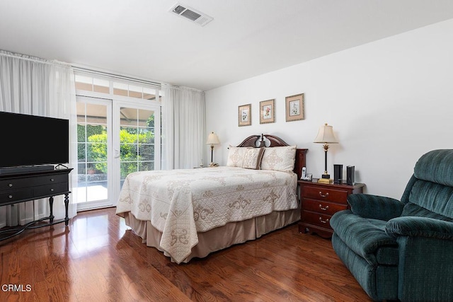 848 S Orange Grove Blvd, Pasadena, CA 91105 - bedroom with access to exterior and dark wood-style flooring