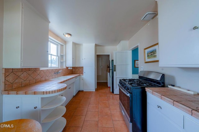 1736 Craig Ave, Altadena, CA 91001 - kitchen featuring stainless steel gas range oven, tile countertops, open shelves, dishwasher, and tasteful backsplash