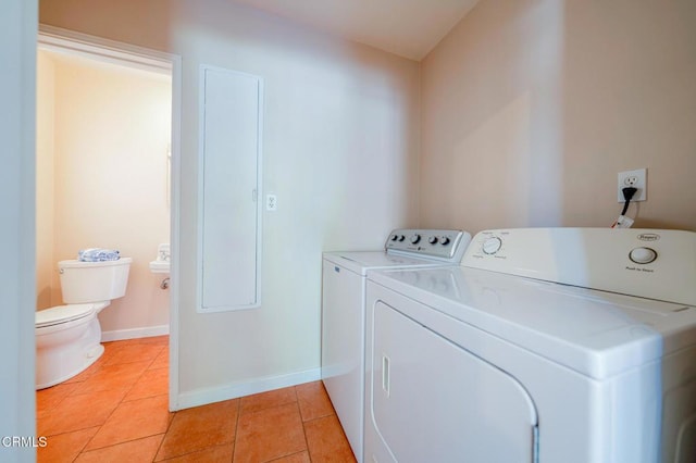 1736 Craig Ave, Altadena, CA 91001 - washroom featuring separate washer and dryer and light tile patterned flooring