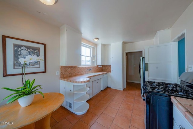 1736 Craig Ave, Altadena, CA 91001 - kitchen featuring black range with gas stovetop, open shelves, backsplash, white cabinetry, and tile counters