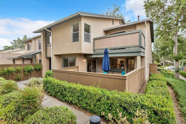 10264 Michala Pl, Santee, CA 92071 - back of property with a balcony and stucco siding