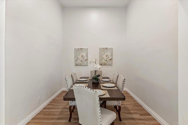 1208 Via Viento Suave, San Marcos, CA 92078 - dining area with baseboards and light wood-style floors