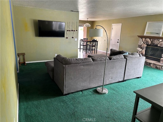 37824 Queensboro Ct, Palmdale, CA 93552 - living area with carpet, a textured ceiling, a fireplace, and baseboards
