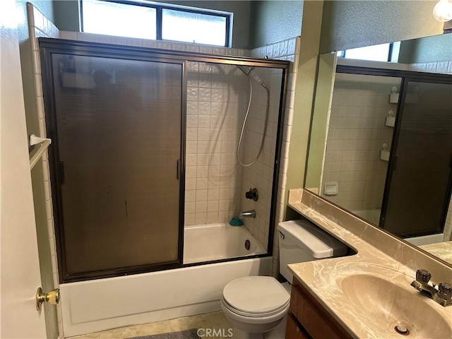 37824 Queensboro Ct, Palmdale, CA 93552 - full bath featuring toilet, a textured wall, vanity, and enclosed tub / shower combo