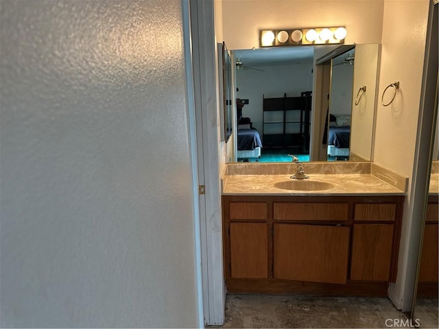37824 Queensboro Ct, Palmdale, CA 93552 - bathroom with ensuite bath, vanity, and a ceiling fan