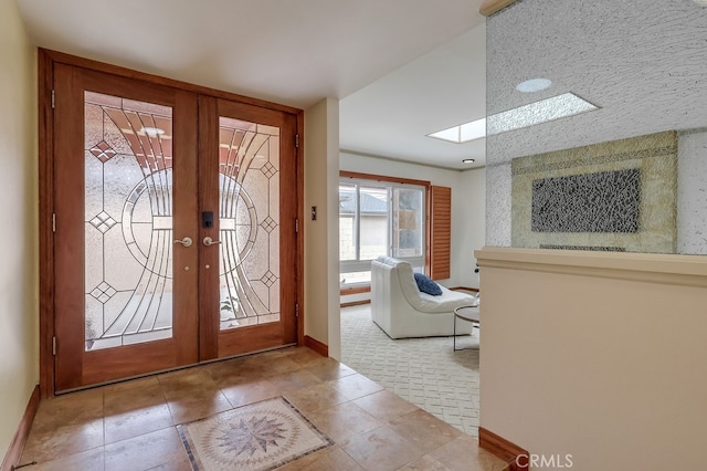 2818 W 166th St, Torrance, CA 90504 - entrance foyer featuring french doors and a skylight