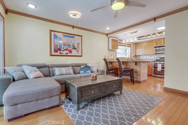2818 W 166th St, Torrance, CA 90504 - living area with crown molding, light wood-style flooring, ceiling fan, and recessed lighting