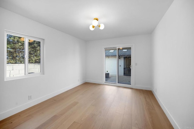 3852 Bledsoe Ave, Los Angeles, CA 90066 - unfurnished room with plenty of natural light, light wood-type flooring, and baseboards