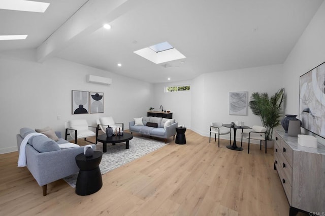 3852 Bledsoe Ave, Los Angeles, CA 90066 - living room with a skylight, light wood-type flooring, a wall mounted air conditioner, baseboards, and recessed lighting