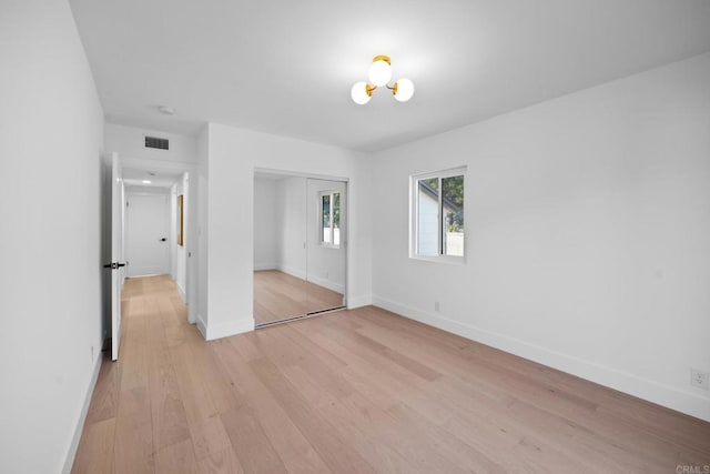 3852 Bledsoe Ave, Los Angeles, CA 90066 - unfurnished bedroom featuring light wood-style flooring, baseboards, and a closet