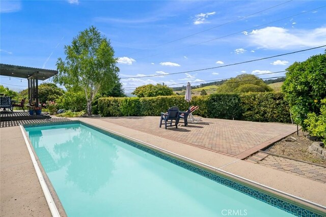 6058 Joan Pl, San Luis Obispo, CA 93401 - view of swimming pool with a patio