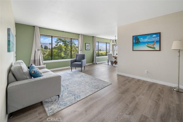 6058 Joan Pl, San Luis Obispo, CA 93401 - living area featuring plenty of natural light and wood finished floors