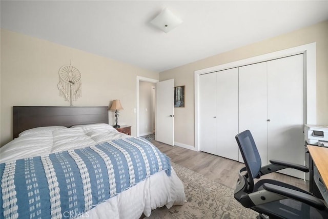 6058 Joan Pl, San Luis Obispo, CA 93401 - bedroom featuring wood finished floors, a closet, and an office area