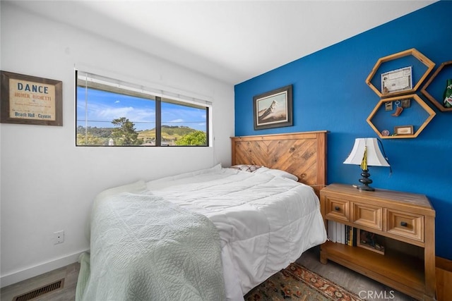 6058 Joan Pl, San Luis Obispo, CA 93401 - bedroom with wood finished floors and baseboards