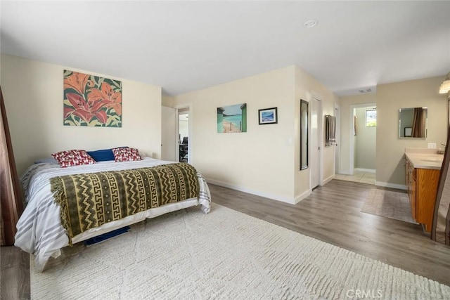 6058 Joan Pl, San Luis Obispo, CA 93401 - bedroom featuring wood finished floors and baseboards