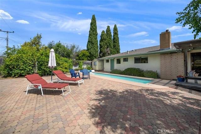 6058 Joan Pl, San Luis Obispo, CA 93401 - view of pool with a patio and a shed