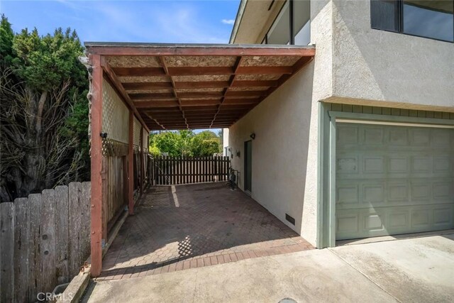 6058 Joan Pl, San Luis Obispo, CA 93401 - view of parking with a carport and driveway
