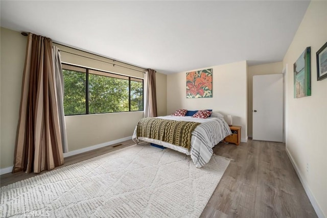 6058 Joan Pl, San Luis Obispo, CA 93401 - bedroom featuring wood finished floors and baseboards