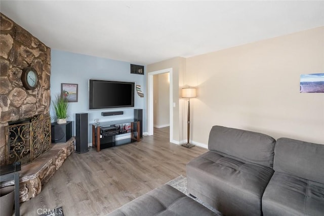 6058 Joan Pl, San Luis Obispo, CA 93401 - living room with wood finished floors and a fireplace