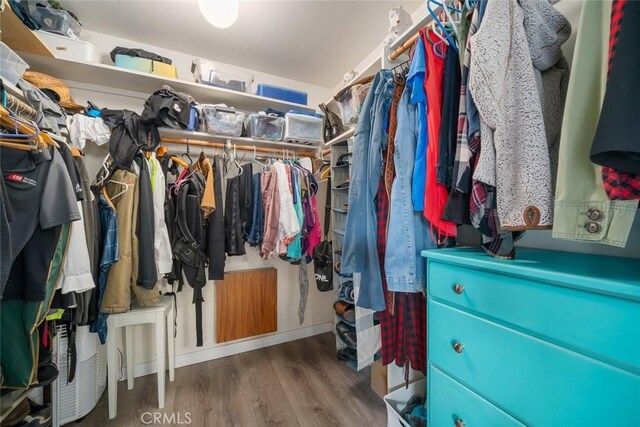 6058 Joan Pl, San Luis Obispo, CA 93401 - walk in closet featuring wood finished floors