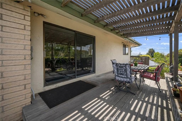 6058 Joan Pl, San Luis Obispo, CA 93401 - deck with outdoor dining space and a pergola