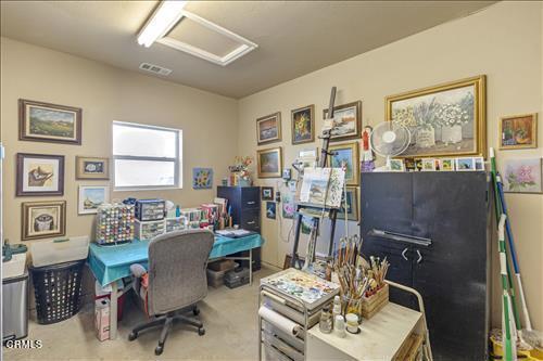 26941 Stirrup Way, Tehachapi, CA 93561 - carpeted home office featuring attic access