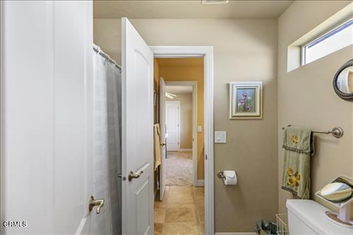 26941 Stirrup Way, Tehachapi, CA 93561 - bathroom featuring toilet and baseboards