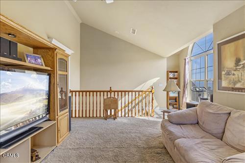 26941 Stirrup Way, Tehachapi, CA 93561 - carpeted living area featuring lofted ceiling