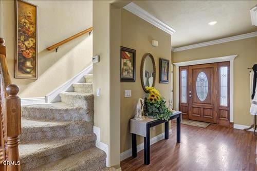 26941 Stirrup Way, Tehachapi, CA 93561 - entryway with stairs, wood finished floors, crown molding, and baseboards