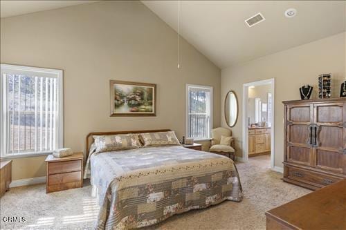 26941 Stirrup Way, Tehachapi, CA 93561 - bedroom featuring light colored carpet, high vaulted ceiling, baseboards, and ensuite bath