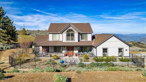 26941 Stirrup Way, Tehachapi, CA 93561 - view of front of home featuring covered porch and a fenced front yard