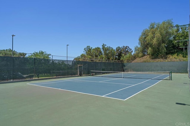 5700 Baltimore Dr Unit 134, La Mesa, CA 91942 - view of tennis court featuring community basketball court