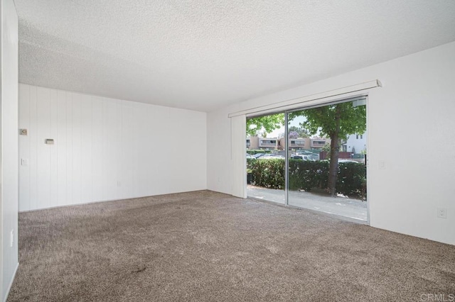 5700 Baltimore Dr Unit 134, La Mesa, CA 91942 - carpeted empty room featuring a textured ceiling