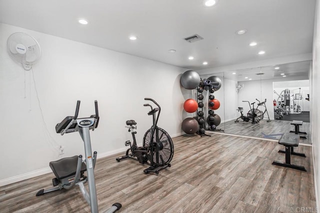 5700 Baltimore Dr Unit 134, La Mesa, CA 91942 - exercise room with recessed lighting, wood finished floors, and baseboards