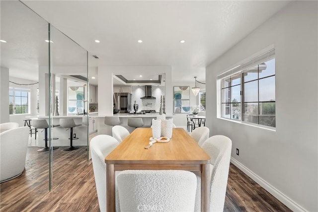 21011 Marin Unit 103, Lake Forest, CA 92630 - dining space with wood finished floors and recessed lighting