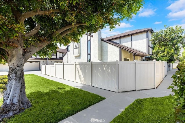 11636 Lambert Ave Unit 12, El Monte, CA 91732 - view of home's exterior featuring stucco siding