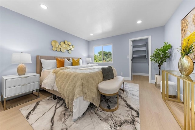 11636 Lambert Ave Unit 12, El Monte, CA 91732 - bedroom with wood finished floors, recessed lighting, a spacious closet, and a closet