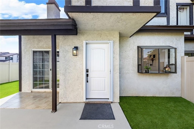 11636 Lambert Ave Unit 12, El Monte, CA 91732 - property entrance with stucco siding and a patio