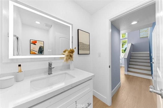 11636 Lambert Ave Unit 12, El Monte, CA 91732 - bathroom featuring vanity, wood finished floors, and recessed lighting