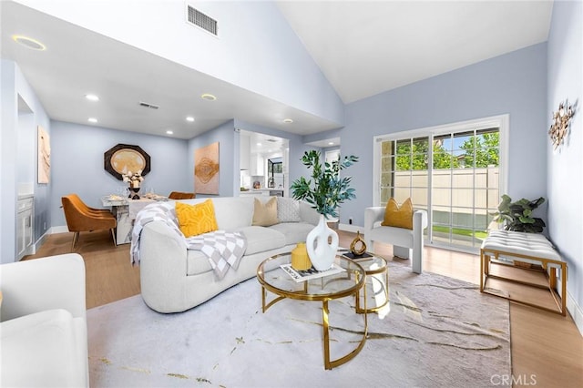 11636 Lambert Ave Unit 12, El Monte, CA 91732 - living area featuring wood finished floors, recessed lighting, and high vaulted ceiling
