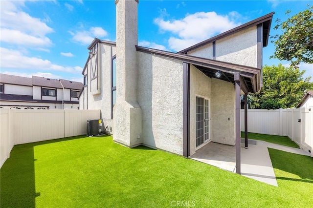 11636 Lambert Ave Unit 12, El Monte, CA 91732 - rear view of house featuring stucco siding, a fenced backyard, and a patio